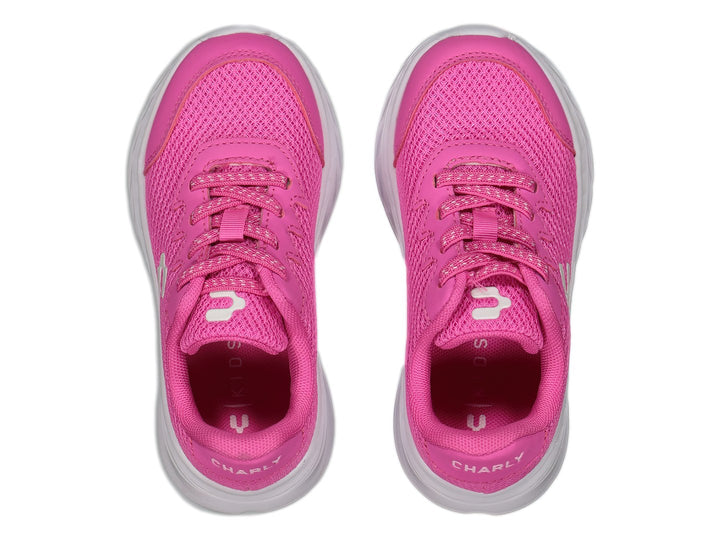 Tenis deportivos Charly en color rosa fucsia con suela blanca y tejido de malla transpirable.