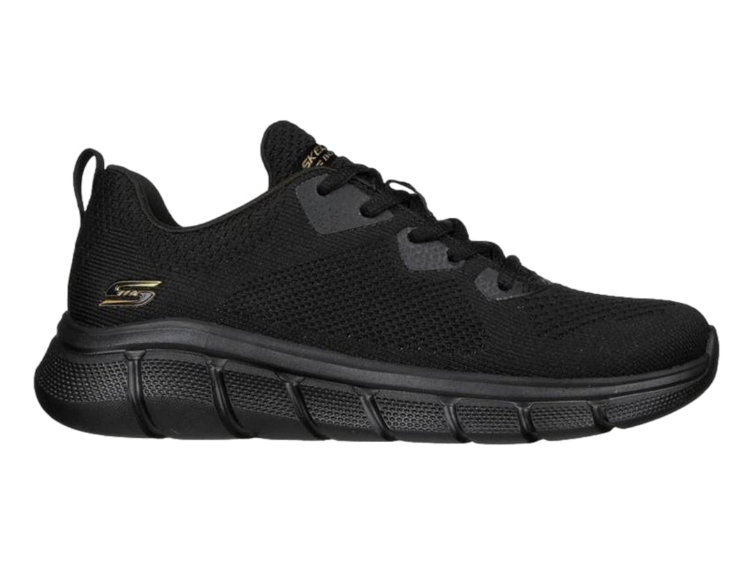 Zapato deportivo Skechers color negro con tejido transpirable y suela flexible.
