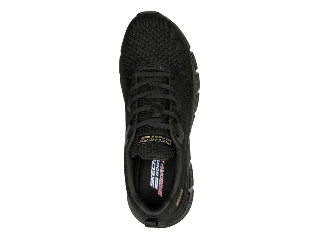 Zapato deportivo Skechers color negro con tejido transpirable y suela flexible.
