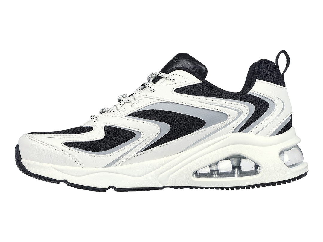 Tenis deportivos Skechers Tres-Air One en color blanco con detalles en negro y gris, con cámara de aire visible en la suela.