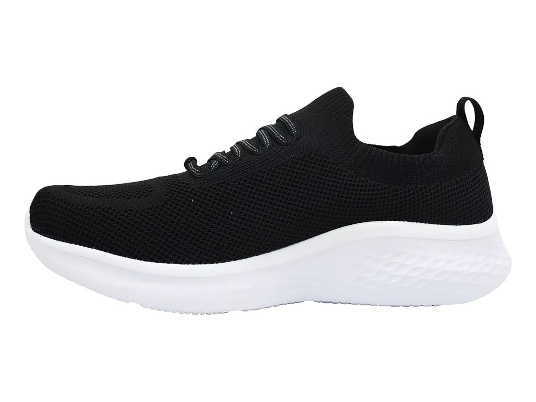Tenis deportivos Skechers Skech-Lite Pro en color negro con suela blanca y agujetas negras.