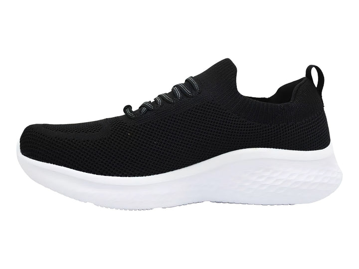 Tenis deportivos Skechers Skech-Lite Pro en color negro con suela blanca y agujetas negras.