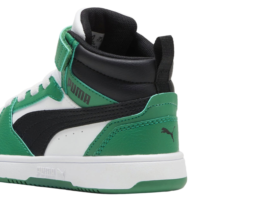 Tenis PUMA Rebound V6 Mid AC+PS en colores blanco, verde y negro con cierre de velcro y cordones.