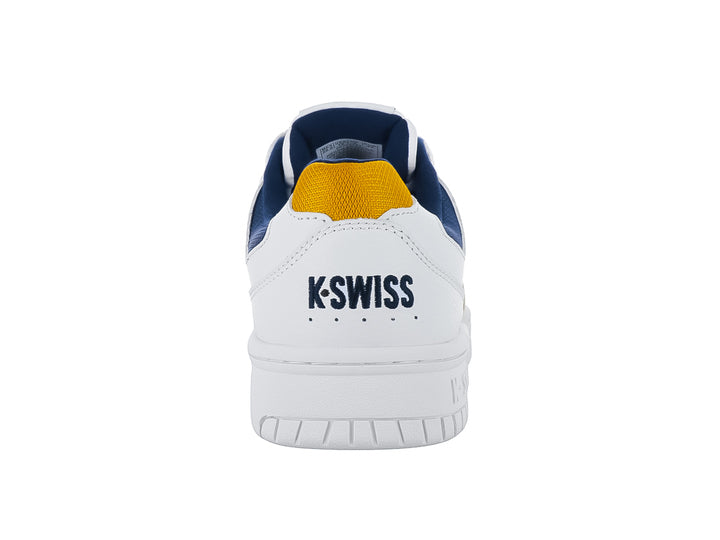 Tenis K-Swiss G-Staad en color blanco con detalles en dorado y azul marino.
