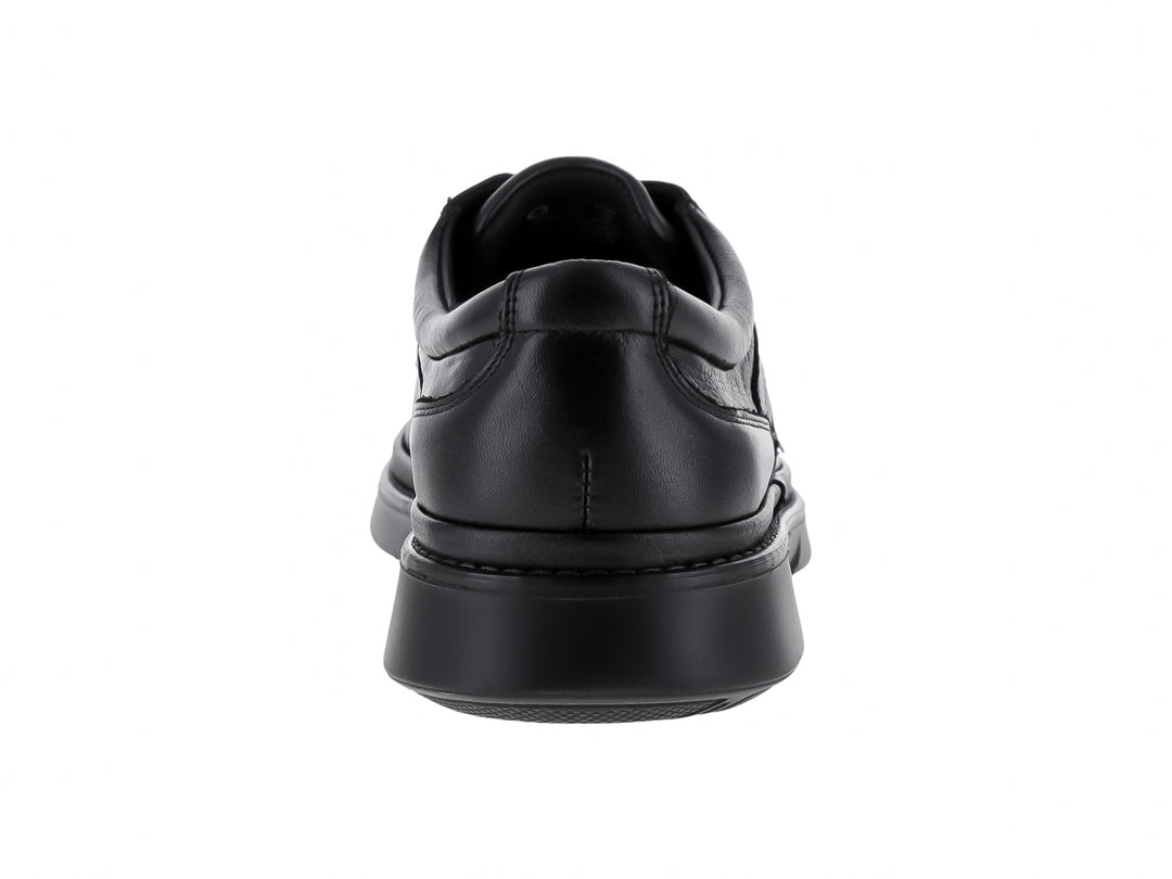 Zapato formal de cuero color negro con cordones y suela robusta para hombre.