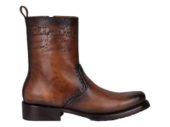 Botas de cuero color castaño marca Cuadra para hombre con suela negra.