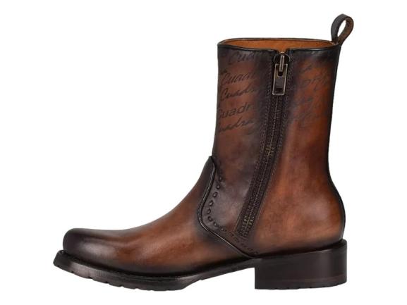 Botas de cuero color castaño marca Cuadra para hombre con suela negra.