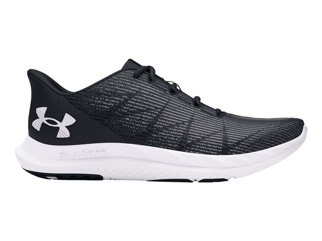Tenis deportivos Under Armour en color negro con suela blanca, vista de perfil.