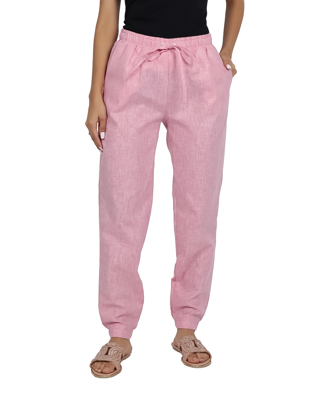 Pantalón básico color rosa con cintura elástica y cordón ajustable.