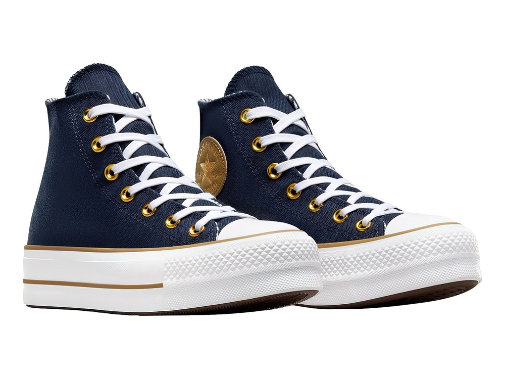 Tenis Converse Chuck Taylor All Star Lift de cuello alto color azul oscuro con suela blanca y detalles en dorado.