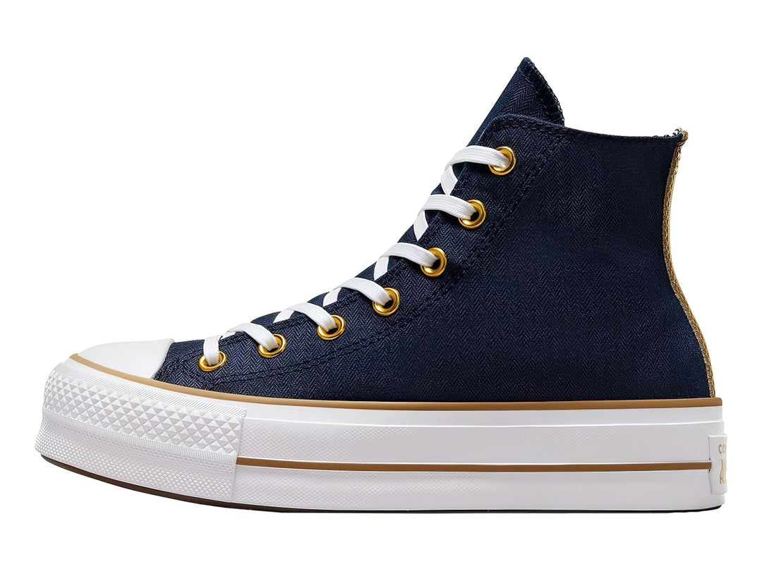Tenis Converse Chuck Taylor All Star Lift de cuello alto color azul oscuro con suela blanca y detalles en dorado.