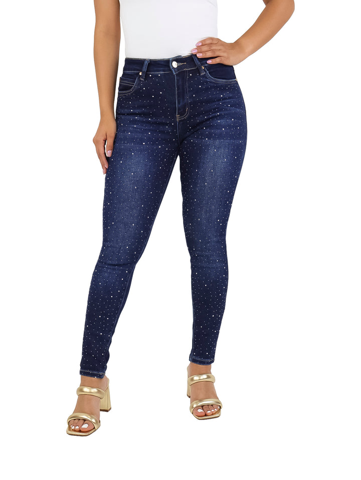Pantalones jeans ajustados color azul marino con pequeños detalles brillantes distribuidos en toda la prenda.