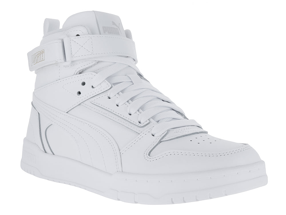 Tenis PUMA blancos de bota con correa en el tobillo y detalles en dorado.
