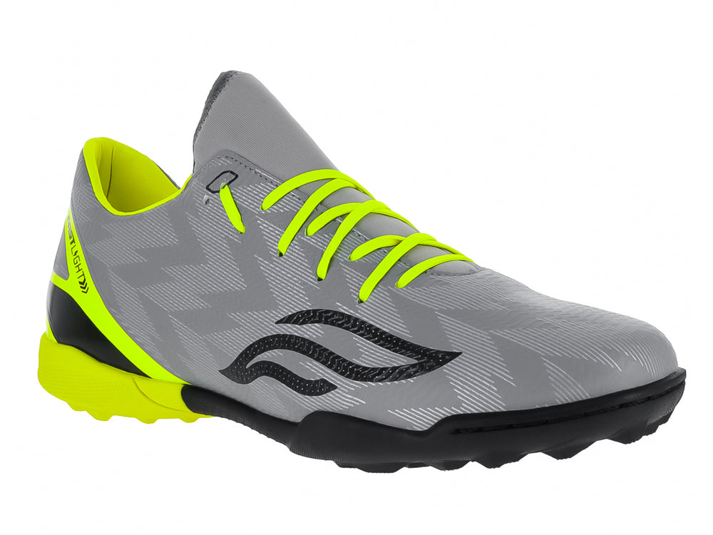 Zapato de fútbol Furia color gris con detalles en amarillo neón y suela negra.