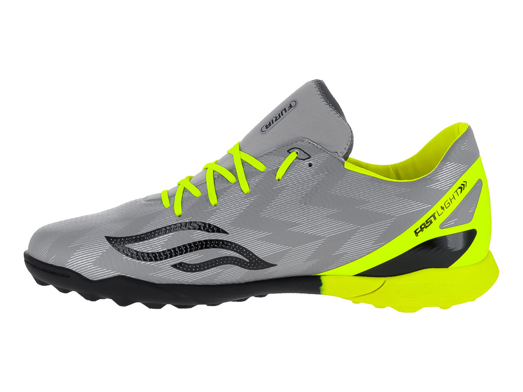 Zapato de fútbol Furia color gris con detalles en amarillo neón y suela negra.
