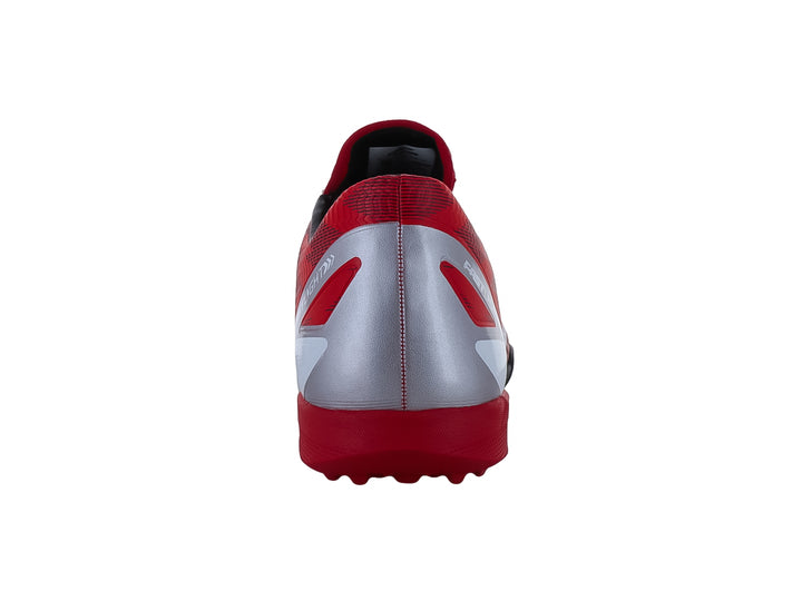 Calzado de fútbol Furia en color rojo con detalles en blanco y suela negra.