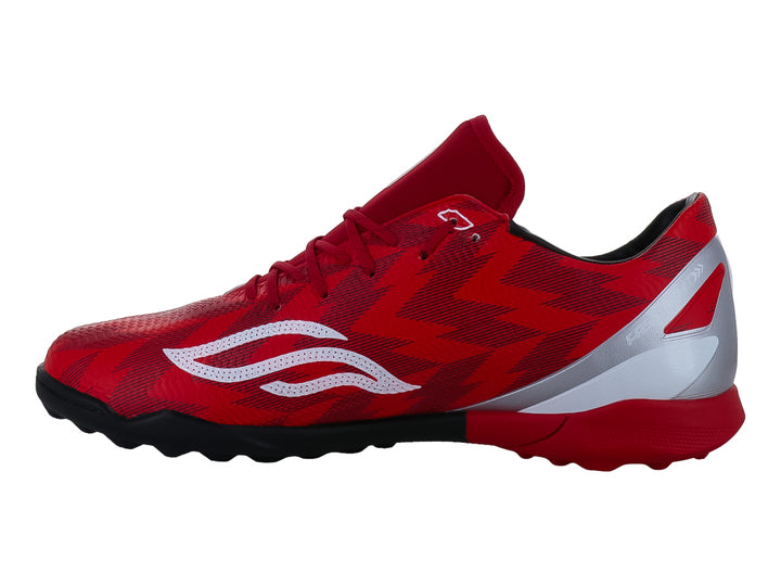 Calzado de fútbol Furia en color rojo con detalles en blanco y suela negra.