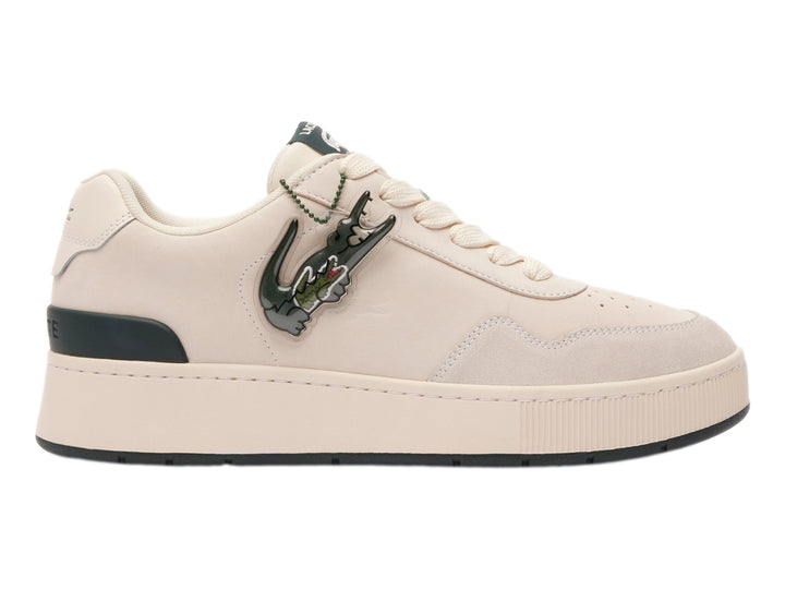 Tenis Lacoste color blanco roto con detalles en verde oscuro y suela ancha.