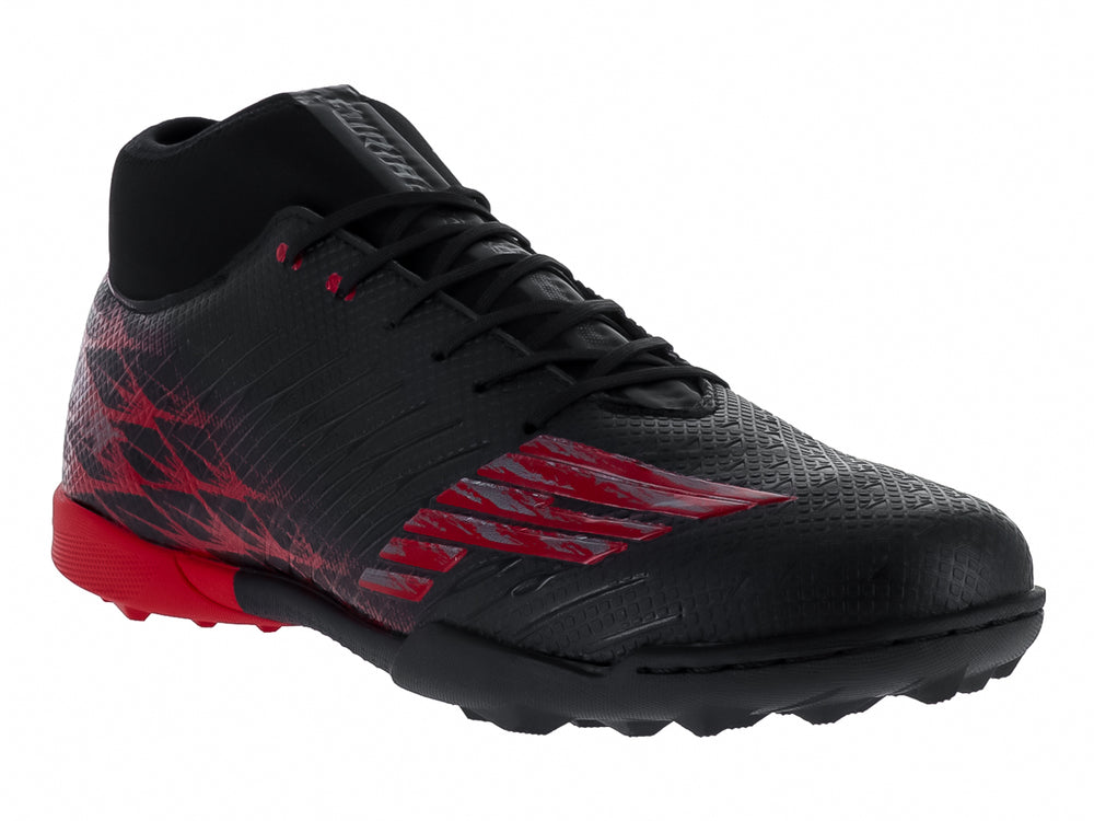 Zapato de fútbol Furia en color negro con detalles y suela roja, material sintético.