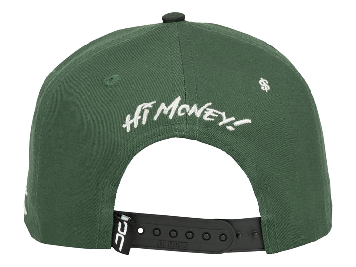 Gorra snapback verde con visera plana y parche frontal de una mano sosteniendo dinero.