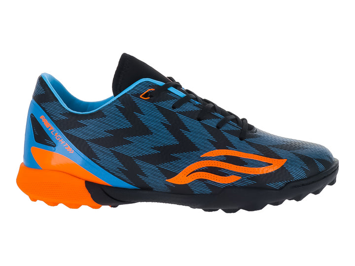 Zapato de fútbol infantil Furia color azul con detalles naranjas y suela negra para césped sintético.