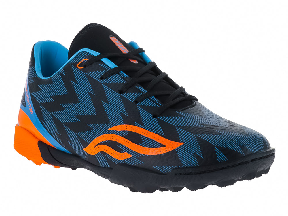 Zapato de fútbol infantil Furia color azul con detalles naranjas y suela negra para césped sintético.