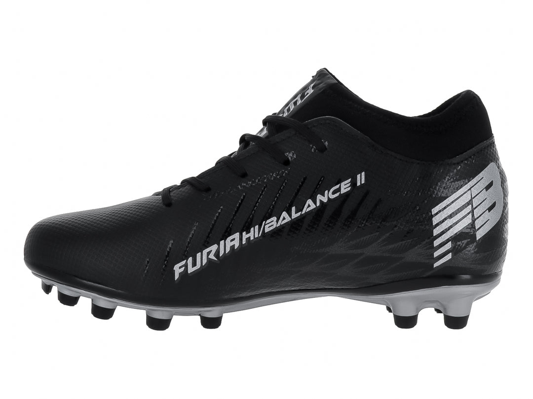 Zapato de fútbol FURIA para niño en color negro con detalles en gris y suela de tacos