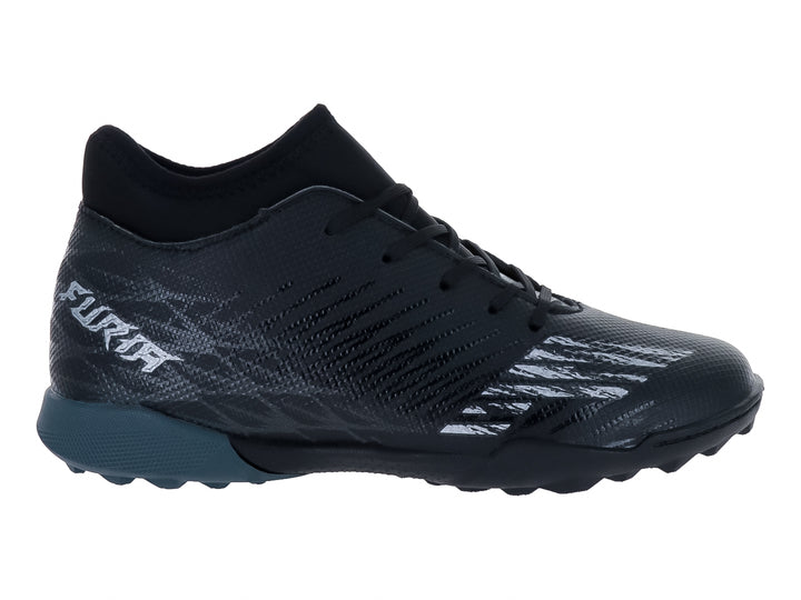 Zapato de fútbol Furia para niño en color negro con detalles en gris oxford y suela para césped sintético.