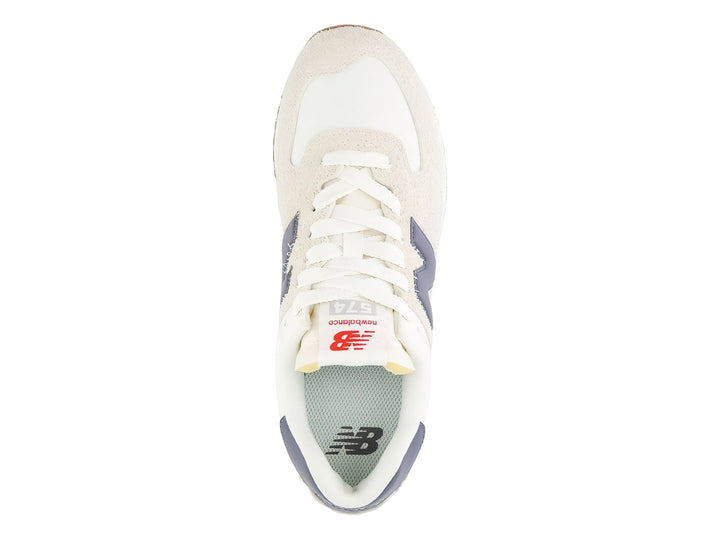 Tenis New Balance WL574Z color moonbeam con detalles púrpura y suela de plataforma blanca.