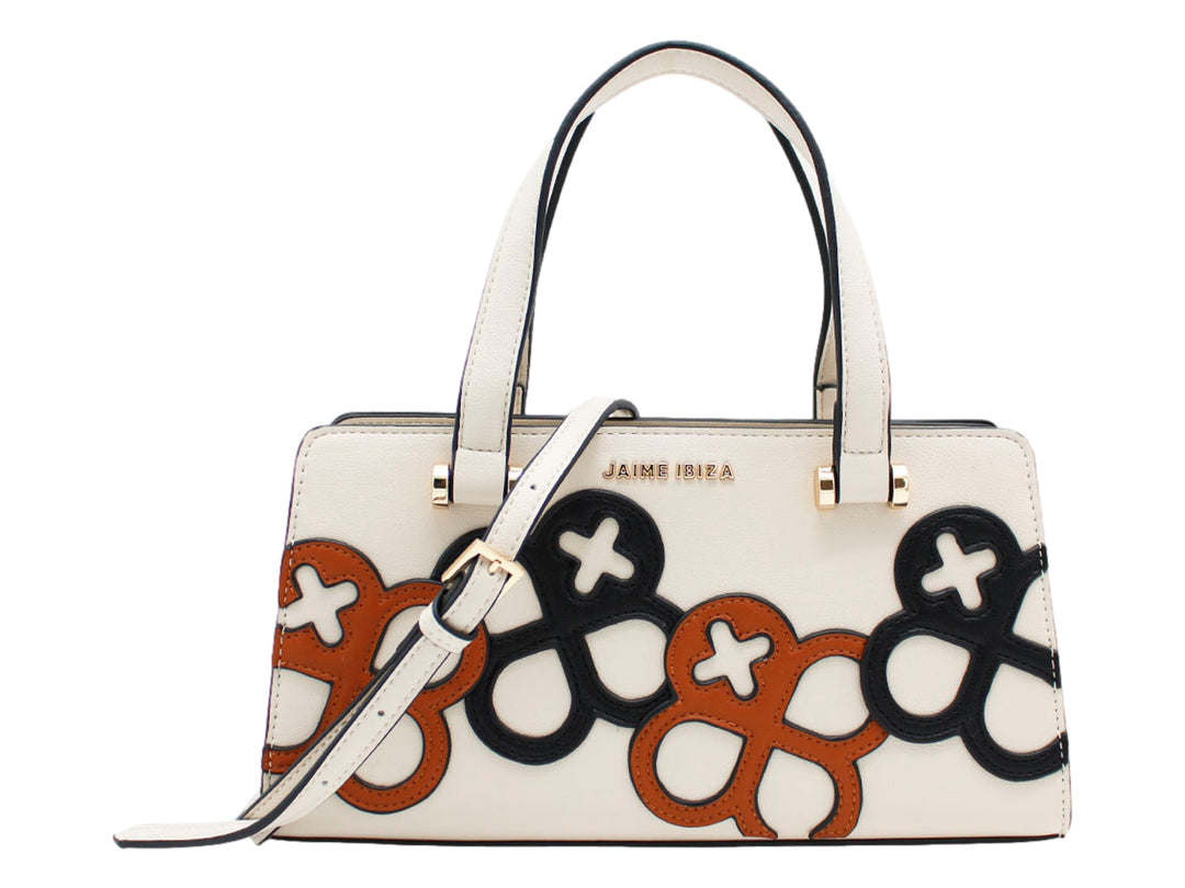 Bolso beige Jaime Ibiza con diseños geométricos en negro y marrón, asas superiores y correa ajustable.
