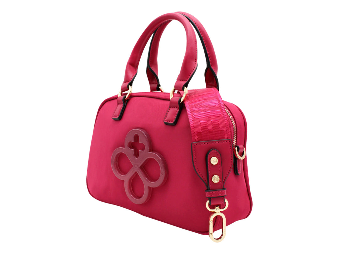 Bolso de mano color fucsia de la marca Jaime Ibiza con asa superior y detalle decorativo frontal.