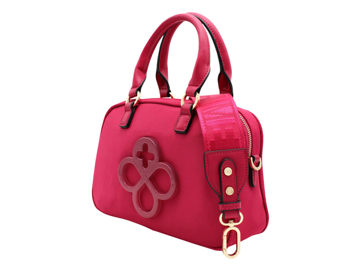 Bolso de mano color fucsia de la marca Jaime Ibiza con asa superior y detalle decorativo frontal.