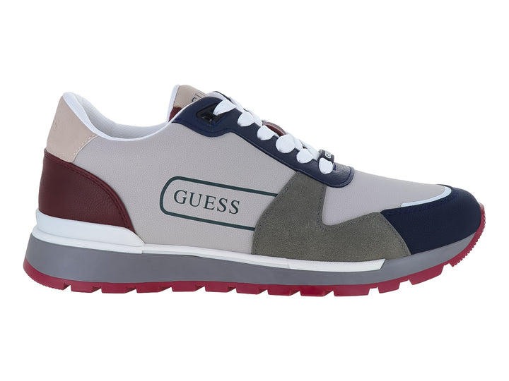 Tenis GUESS deportivos en colores gris, azul y guinda con suela robusta y cordones blancos.