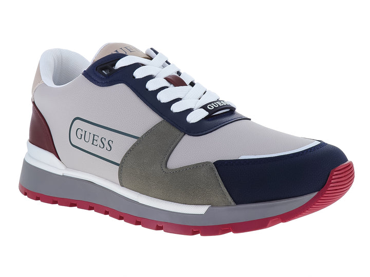 Tenis GUESS deportivos en colores gris, azul y guinda con suela robusta y cordones blancos.
