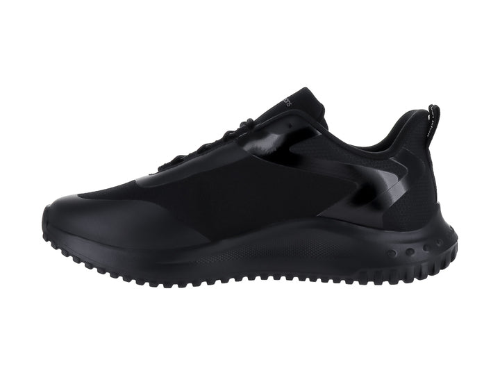 Tenis deportivos Calvin Klein color negro con suela gruesa y detalles brillantes.
