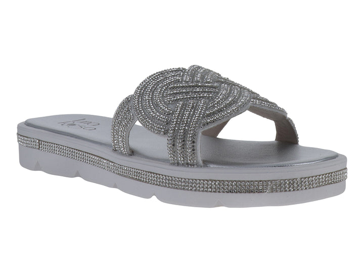 Sandalias planas color plata con tira brillante trenzada y suela blanca para niña.