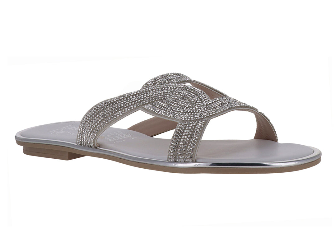 Sandalia plana color plata con tiras cruzadas decoradas con brillos para niña.