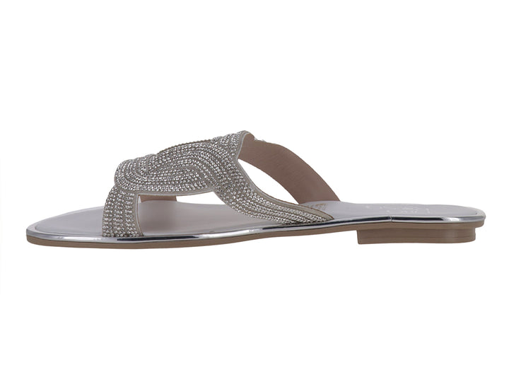 Sandalia plana color plata con tiras cruzadas decoradas con brillos para niña.