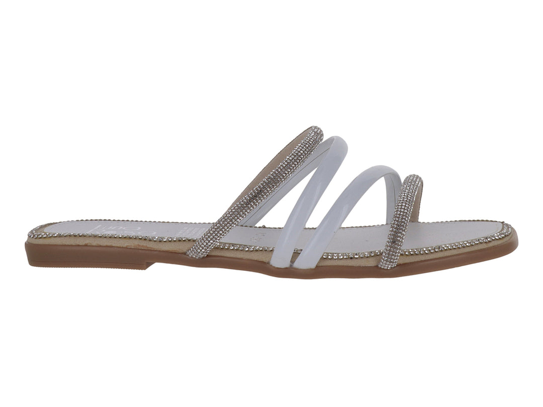 Sandalia plana para Niña en color blanco y plata con tiras brillantes decorativas.