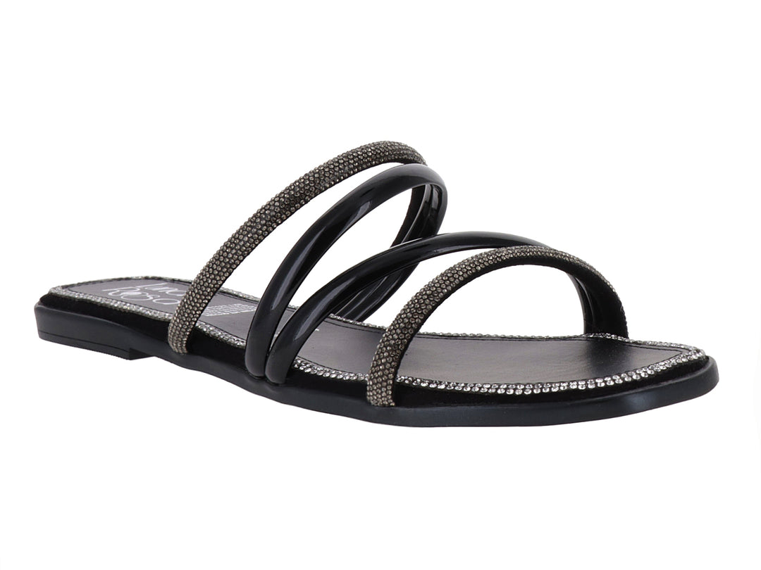 Sandalia plana color negro para mujer con tiras cruzadas decoradas con brillantes dorados.