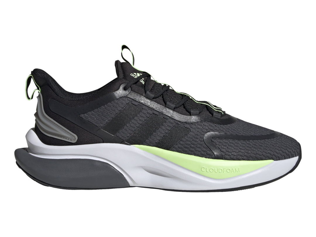 Tenis deportivos Adidas en color gris oscuro y negro con detalles en verde neón y suela blanca.