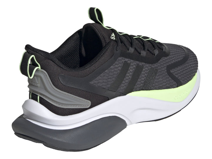 Tenis deportivos Adidas en color gris oscuro y negro con detalles en verde neón y suela blanca.