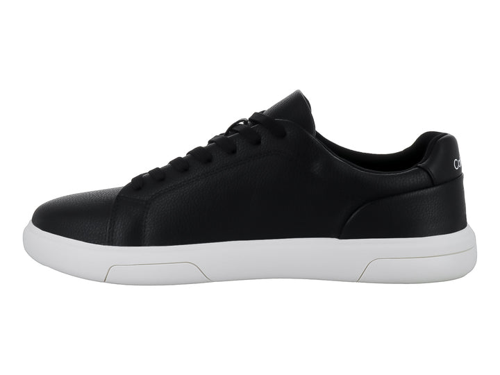 Tenis Calvin Klein para hombre en color negro con suela blanca.