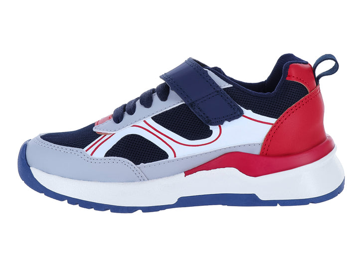 Zapato deportivo infantil marca BICHOS en colores azul marino, gris y rojo con suela blanca y cierre de velcro.