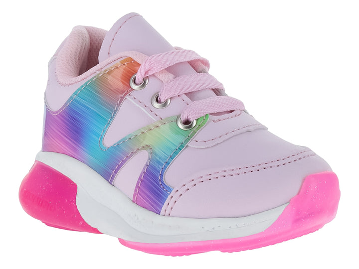 Tenis deportivos para niña color rosa con detalles multicolores iridiscentes y suela rosa.
