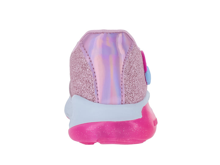 Tenis deportivos para niña en color rosa con glitter, decorados con un arcoíris y una estrella dorada.