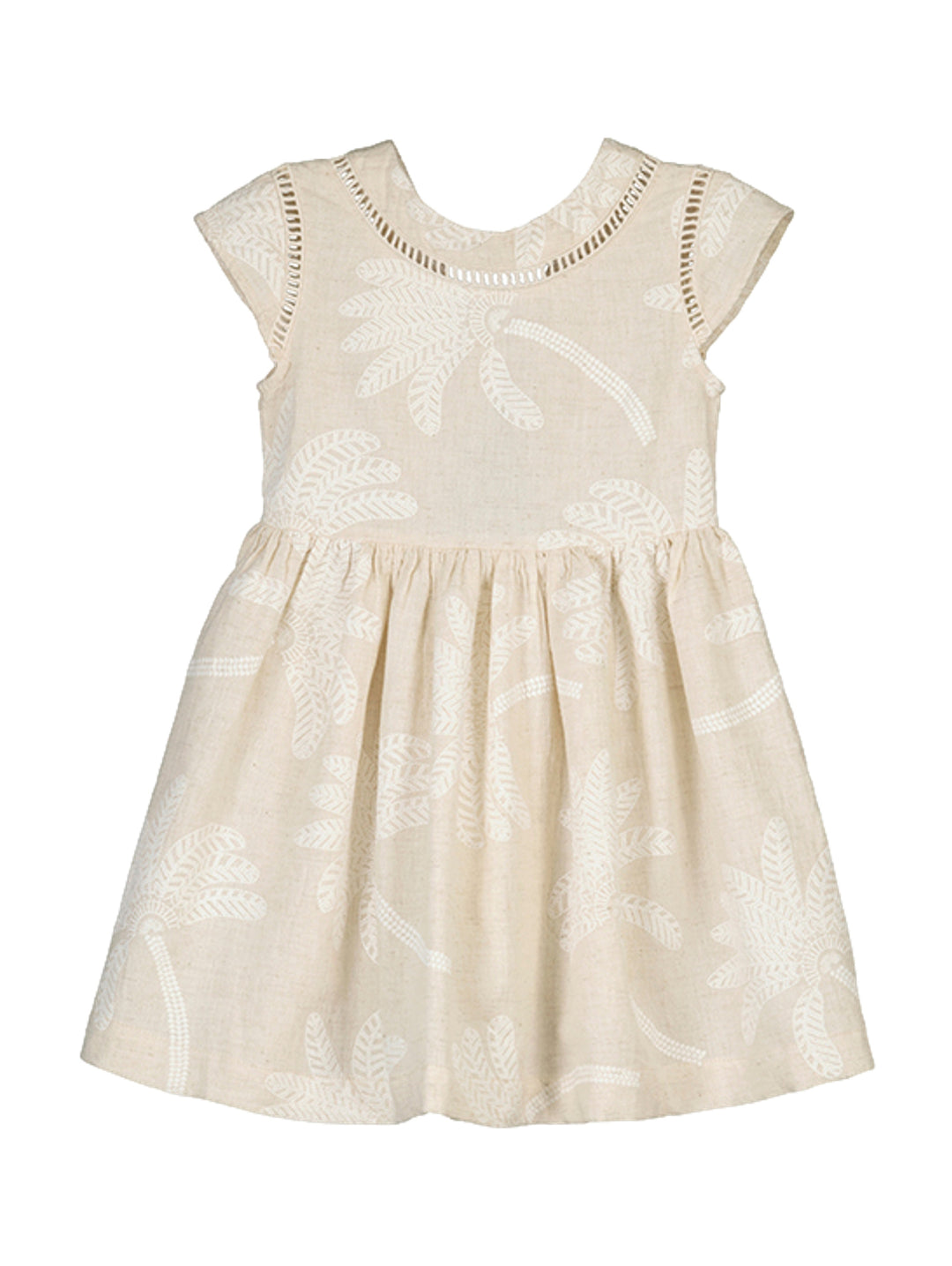 Vestido corto para niña en color beige con estampado de palmeras blancas y detalles calados en el cuello.