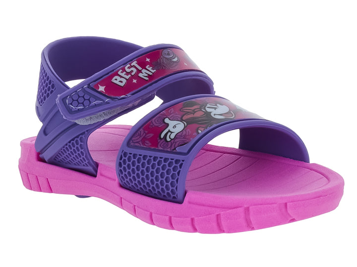 Sandalia infantil con suela rosa y correas moradas con textura hexagonal y detalles decorativos.