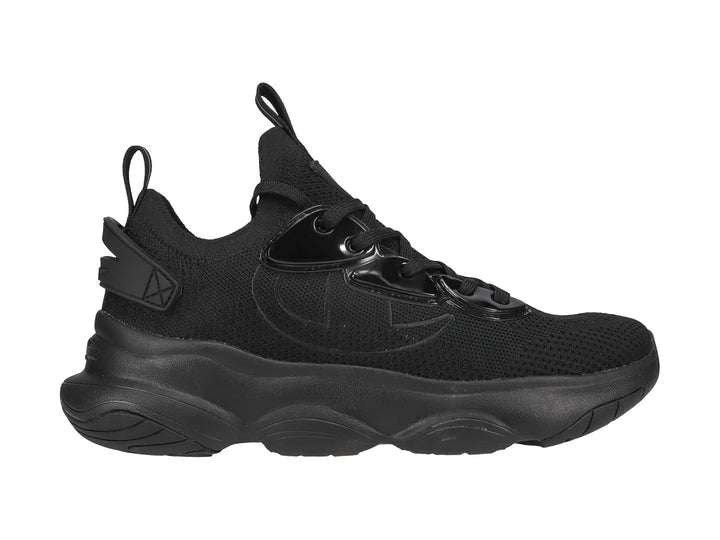 Tenis deportivos Champion color negro con suela ancha y detalles brillantes, diseñados para niños.