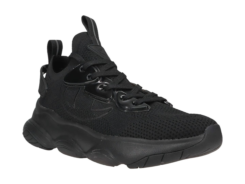 Tenis deportivos Champion color negro con suela ancha y detalles brillantes, diseñados para niños.